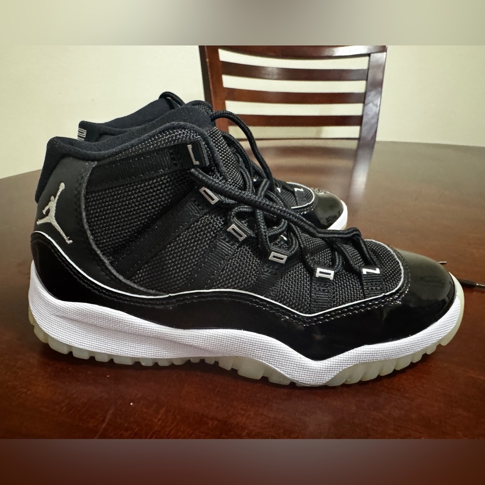 Jordan 11 Retro PS in Black and Multicolor